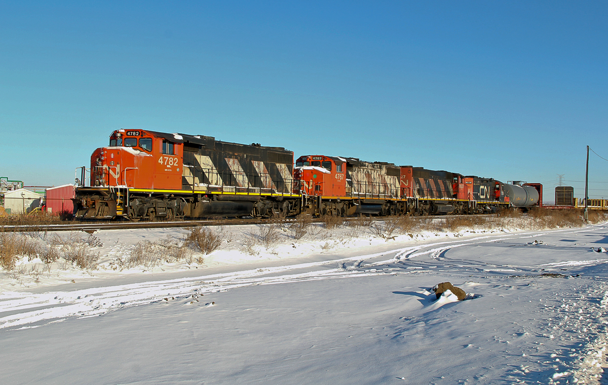 Snapped on a typical Alberta winter day, -20C but clear and sunny.  This lashup is switching at CN's Clover Bar yard on the east side of Edmonton.  CN GP38-2(W)'s 4782 and 4767 with GP40-2L(W) 9527 and GP9RM 7213
