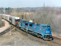 In the mid-90s; there were 25 Lease Management System units (LMSX) on lease to CN. Numbers 715-739. In 2001 CN took 728-739 on long-term lease, renumbered them into IC 2455-2466, and purchased them Oct 31/12, save for 2464, which was lost in a wreck. For a while, these bright blue Dash-8s were relatively common, but to get a pair of them up front was not. Here we see from the 'Point' at Hamilton West railfans lookout, on a most pleasant April mid-day, LMS 734, 738 and CN 9560 rolling eastward.