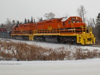With the snow falling RLK 3410 leads with RLK 3409 trailing with a short train to Sudbury