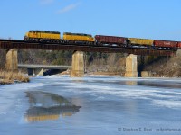 GEXR 580 crosses the Grand River with 36 cars for the yard in Kitchener.