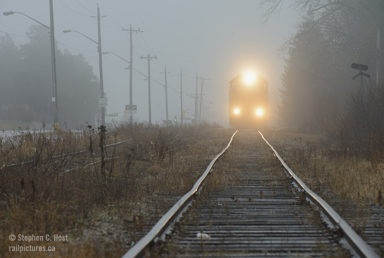 Rocking back and forth on a rickety branchline, 580 heads north on the former Fergus sub in a bid to service the industries in Guelph.