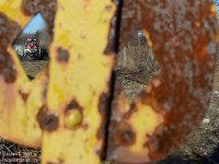 Something a little different - An old cast iron restricted clearance sign stands guard as it has for the last 100 plus years while a pair of MLW's switch Chemtura, former Uniroyal on the Fibreglass lead.