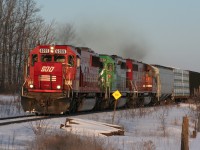 SOO 6055, GCFX 3067 and NREX 783 lead CP 245 west at the West Siding Switch Wolverton near the end of a nice winter day in 2008.