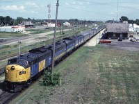 Via Rail FP9A 6502 leads train #1 as it stops at the Canadian National station in Portage la Prairie, Manitoba. The Canadian Pacific station can be seen above 6502.