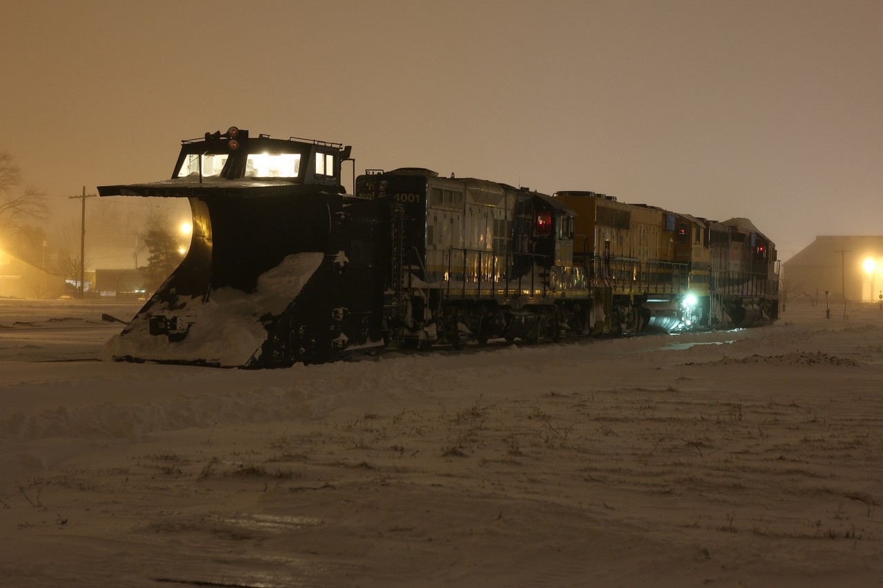 Goderich -Exeter plow extra spent the previous day plowing the Guelph sub to Kelly's. The train idles away in the -20 wind chill in the yard in Stratford. In a few short hours the power will be throttled up and will begin digging out the line to Goderich.