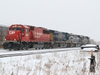 CP 6232, CSX 3140, NS 7675, NS 2705 power CP 147 as they work Lambton yard on a snowy Sunday afternoon