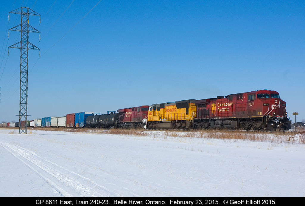 CP 8611 East limps it's train toward Belle River on a very cold February morning.  8611 had dumped it's air about a mile back and was having trouble getting pressure back up.  Eventually they were able to get enough air on the rear of the train to limp at about 5mph the remaining 3 miles to Belle River so that they could allow 2 westbounds to pass by and inspect their train for the cause of the problem.