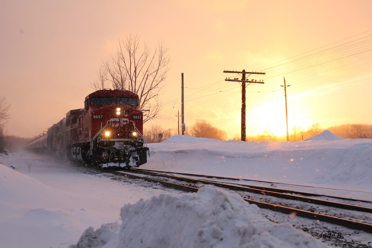 CP 550 leaves Wolverton after a 12000 foot 245 passes with a Soo in trail.