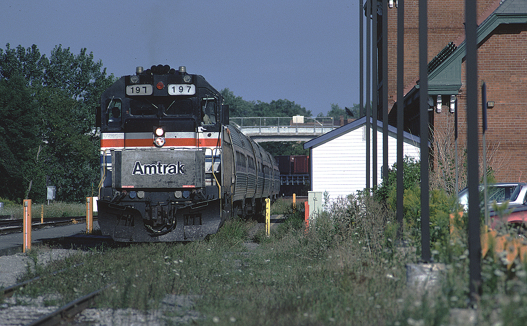 Amtrak GP40TC 197, a former GO Transit unit, is cooling its heels at Niagara Falls waiting to the Maple Leaf onward to Toronto to complete its trip from New York City.