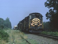 CBNS C-630 2034 leads #408 through Georges River getting close to the train's destination of Sydney. The train left Truro with interchange traffic from Canadian National the previous evening. 