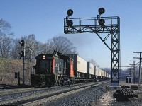 CN SW1200RS 1361 is heading back into Hamilton after coming out to Bayview to turn some piggyback trailers on the wye.