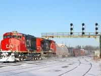 CN 5291 - CN 2177 passing under the signal bridge at Paris Jct with M33131 02