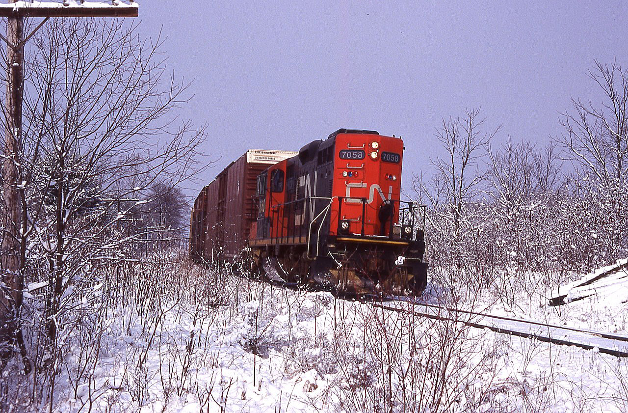 How many crews stop to photograph their own train? On a spur track like this you can pretty well stop any where you want.
It also helps when all crew members are railfans.