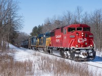 <b>Apple Crisp!</b> A brawny EMD SD60M (ex-SOO 6059) guides Canadian Pacific train # 640 down the Hamilton Subdivision, just south of the 'Guelph Junction' mileboard on a crisp February afternoon. 