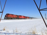 CP 8519, with helper CP 6256, are in charge of U.S. bound train 551 at mile 88 on the CP's Windsor Sub.