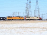 Doing track speed CP 242 makes its way east along Canadian Pacific's Galt Sub.