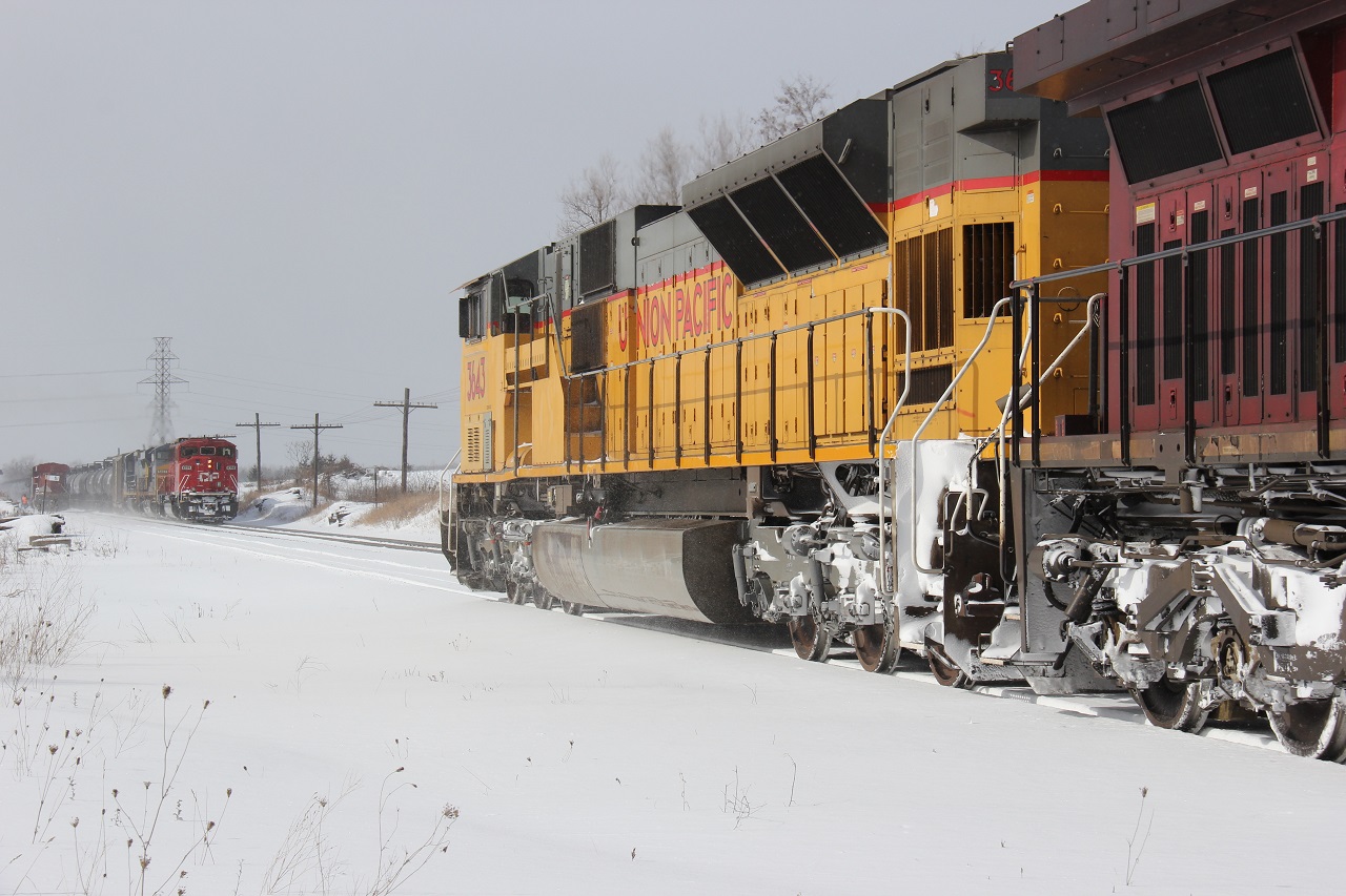 The intense snowsquall has finally subsided on this cold and snowy Valentine's Day 2015, revealing CP 640 waiting on the main at Orrs Lake siding on the CP Galt Sub. I was delighted to hear that a CP 6259 East was meeting a UP 3643 west (CP 235) at Orrs Lake. Note the solo CP GE (# 8879) ahead of 235.