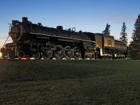<b>CN 6200 at dusk.</b> CN 6200 has seen better days. It is on the outside grounds of the Canada Science and Technology Museum in Ottawa which has better two preserved 4-8-4's inside. 