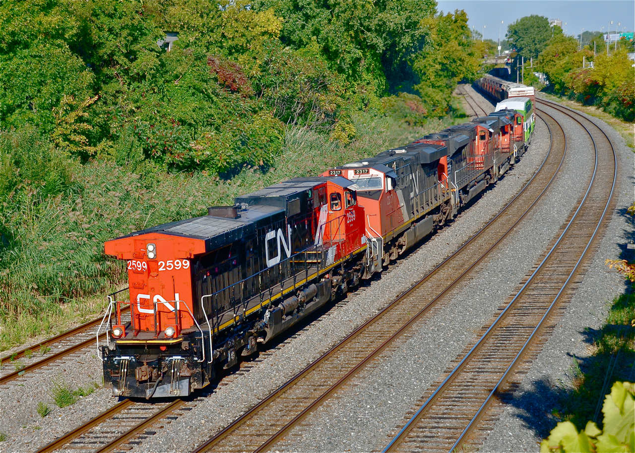 Hammerhead! CN 527, a local transfer in Montreal that goes from Southwark Yard to Taschereau Yard and back has CN 2599 (fresh from Canadian Allied Diesel) running long hood forward, with four more units and a repainted GO Transit coach behind it (CN 2317, CN 8811, CN 4719, CN 7277 & GOT 2431). CN 527 has been running with as many as 150 cars as of late, though presumably only 2-3 of the units were online.