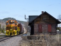 The Quebec Gatineau train for Thurso passes the boarded-up ex-CP Calumet Station. It has a pair of geeps (QGRY 2009 and 2502) and 14 cars. Thanks to Ken Goslett for driving and choosing the spots, as this was my first time shooting this scenic line. 