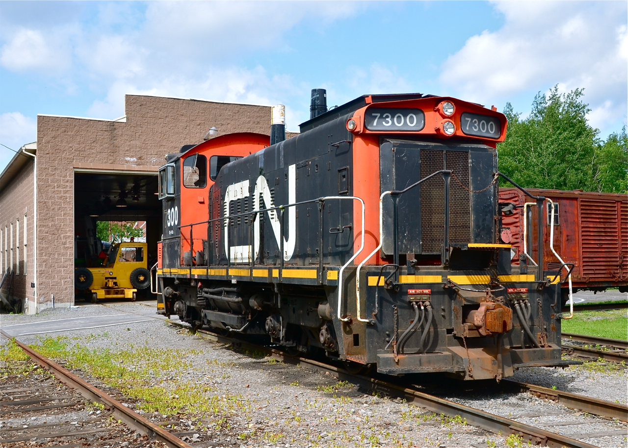 Last June, CP 318 dropped off CN 7300 (an SW1200RSm) at Exporail, as CN had donated it to the museum. Here it sits outside the shop area, where a trackmobile is barely visible. CN 7300 was built by GMD in London, Ontario as CN 1382 in 1960. CN rebuilt it in 1987 when it got its new number. A few months later CN 7300 was repainted into its original paint scheme.