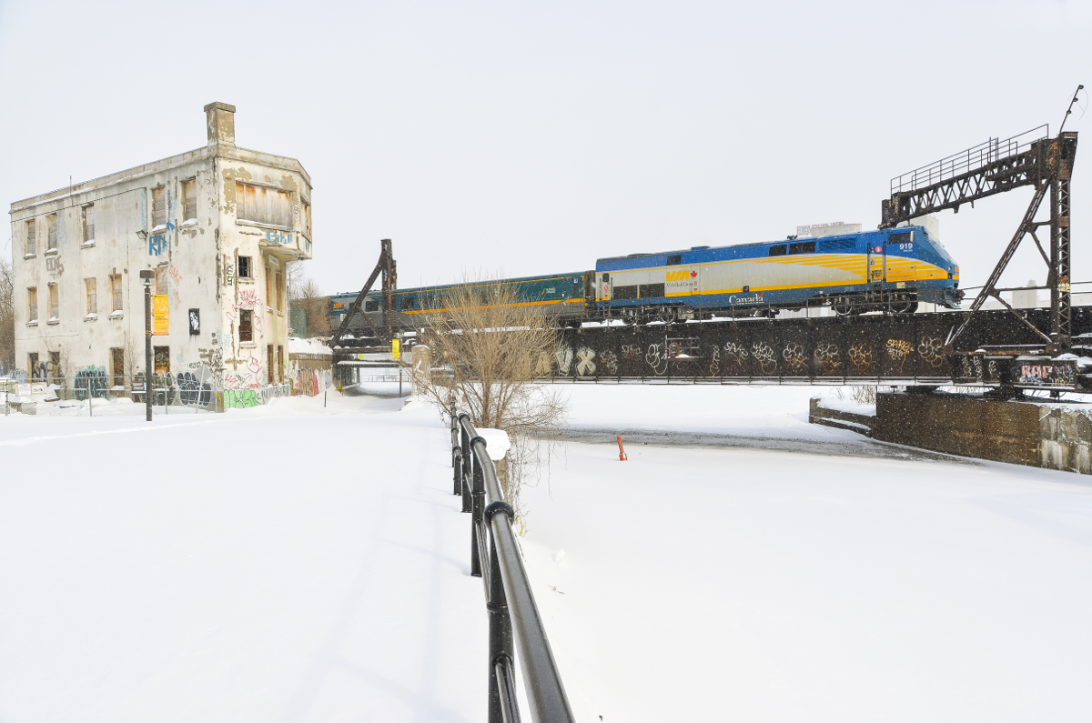 VIA 55 for Toronto is led by VIA 919 as it passes the abandoned Wellington tower.
