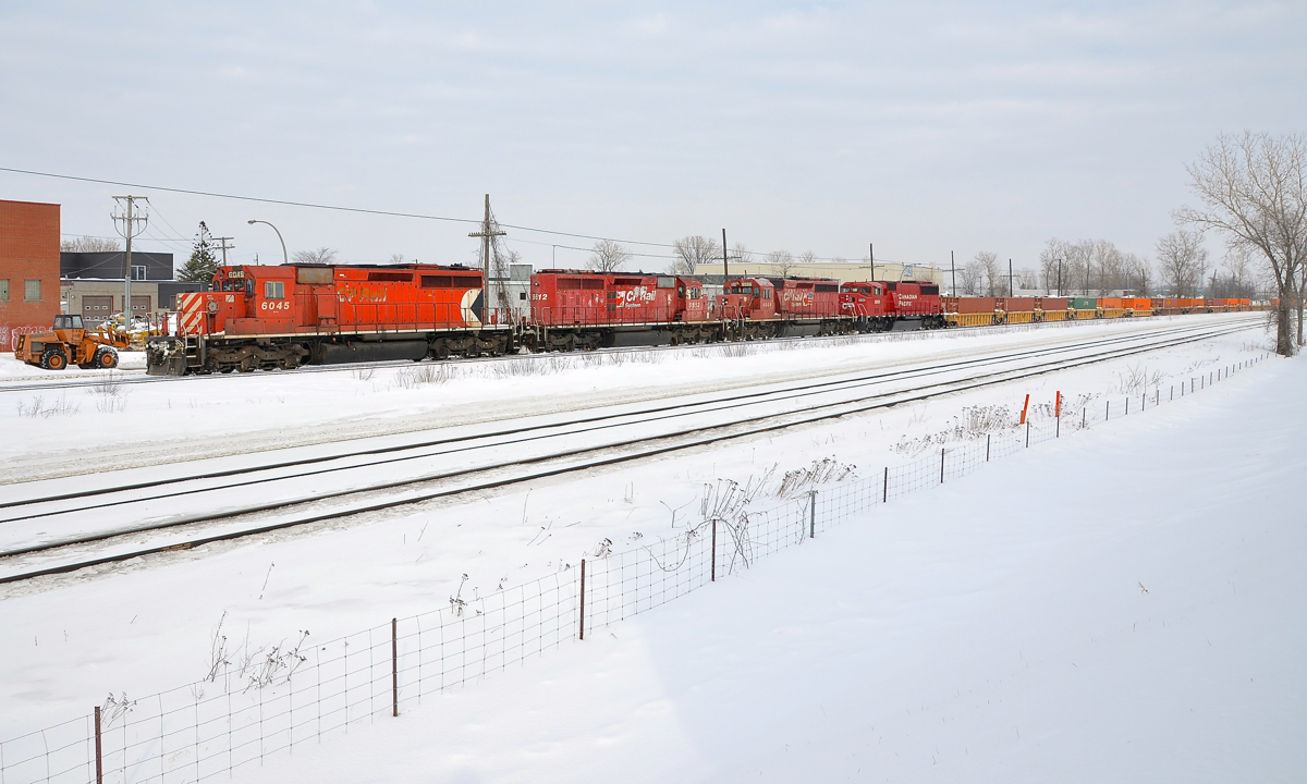 EMD 4-pack on CP 143. CP 143 has four EMD products (CP 6045, CP 5612, CP 6066 & ex-SOO Line CP 6260) as it slowly starts to leave Dorval after receiving its signal.