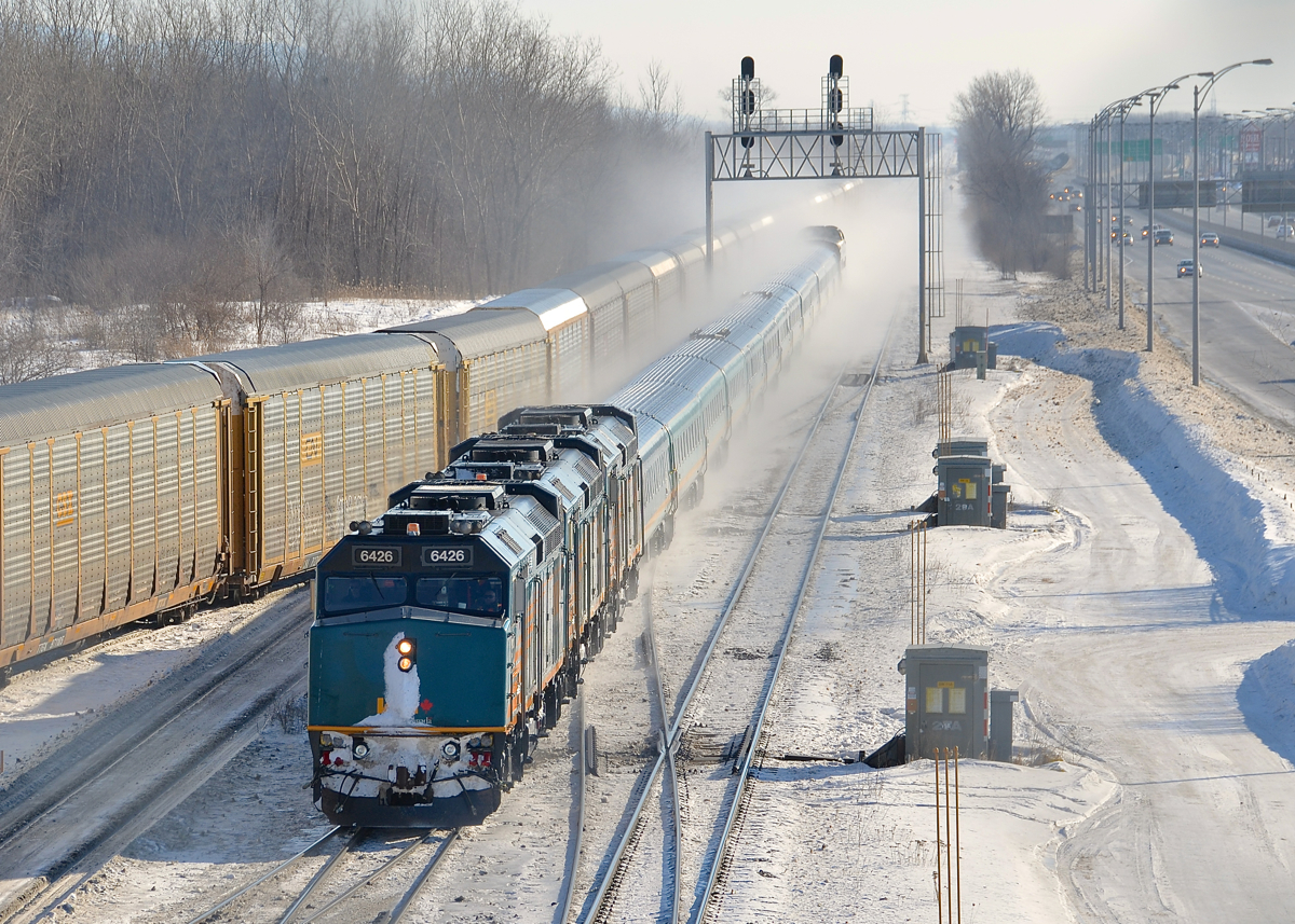 A trio of F40's (with VIA 6426 in the lead) lead VIA 15 (The Ocean) towards Southwark Yard in St-Lambert, Qc. It is about 20 minutes away from its terminus of Montreal's Central Station and it is on time this morning.