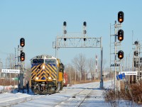 <b>Approaching St-Lambert Station.</b> A short CN 527 is westbound through St-Lambert with CREX 1205 & NS 2549 as it approaches St-Lambert Station. 