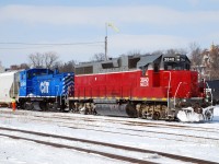 NECR 3840 and CEFX 1569 have returned from Ingenia and are in the process of setting off five cars for CN in Brantford yard. I wonder if these two locomotives ever worked together before? Both came from Conrail, NECR is ex. CR 7904 and CEFX 1569 is ex. CR 9575.