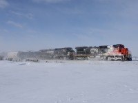 CN 2016 with NS 9157 cross Stewardson Sideroad east of Wyoming, ON.