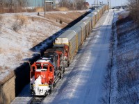 Train 393 heads into the St. Clair River Tunnel with CN 5481 and CN 2122.