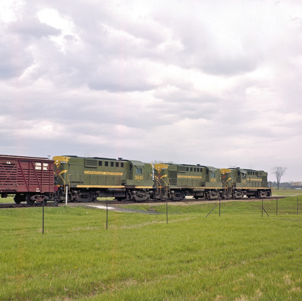 Circa 1959, the late Del Rosamond captured this trio of MLW RS18's under a threatening sky.