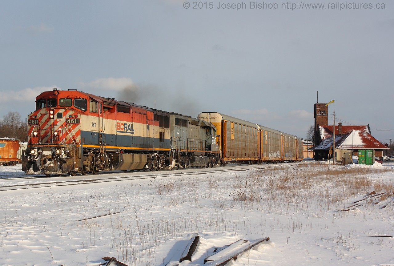 One day after a massive snow storm hit Southern Ontario, a very late CN 393 is seen rolling through Brantford with BCOL 4611 and GTW 5947 providing the power.