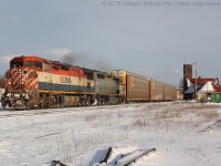 One day after a massive snow storm hit Southern Ontario, a very late CN 393 is seen rolling through Brantford with BCOL 4611 and GTW 5947 providing the power. 