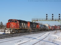 A veteran SD40-2W leads CN train M33131-10 under the signal bridge at Paris Junction with a lengthy train.  CN 5296 and CN 5639 were the power on 331 on this day.  They crew was having issues with the 5296 and spent quite a bit of time talking with the diesel doc to sort out issues.