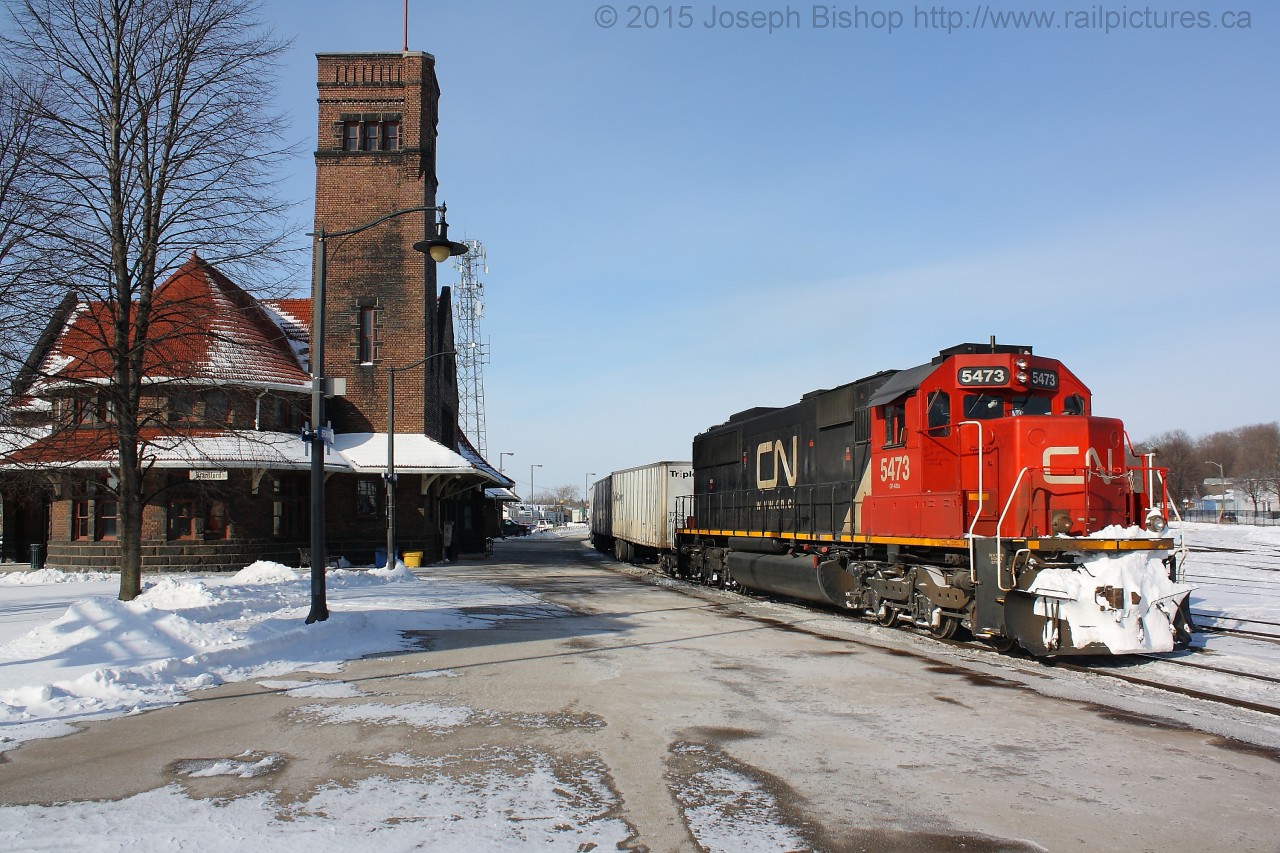 On a cold February morning, CN 144 slowly makes their way out of Brantford after having a crew change at the station.