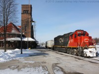 On a cold February morning, CN 144 slowly makes their way out of Brantford after having a crew change at the station.  