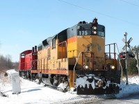 Having been trackside at Ingersoll, I was on my way home and visited the Bakery at Courtland. As I left the shop I heard a train horn and quickly made my way to the ex Trillium line and found 175 and 1249 cutting a path through the snow light engine to go and pick up at Cargill. They were at the highway #59 crossing to the west of the town.  No plow needed today and the first time I have seen any locos working in Courtland.