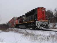 Robert's Bank, BC - Toronto BIT, ON train Q10251 makes an appearance on the York Subdivision with as seen here a SD70M-2 locomotive shoving on the tail end bringing this beast up the grade at Snider.
