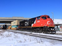 Its -25, feeling like -40 with the wind. Its cold. And Canadian National intermodal freight train Q10251 from British Columbia, Canada rolls by with a fresh EMCC SD70M-2 on point. About midway, was an Illinois Central GE DASH 9-44CW in CN paint locomotive helping.