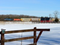 CP 147 with a pair of oddballs head west on the Galt Sub.