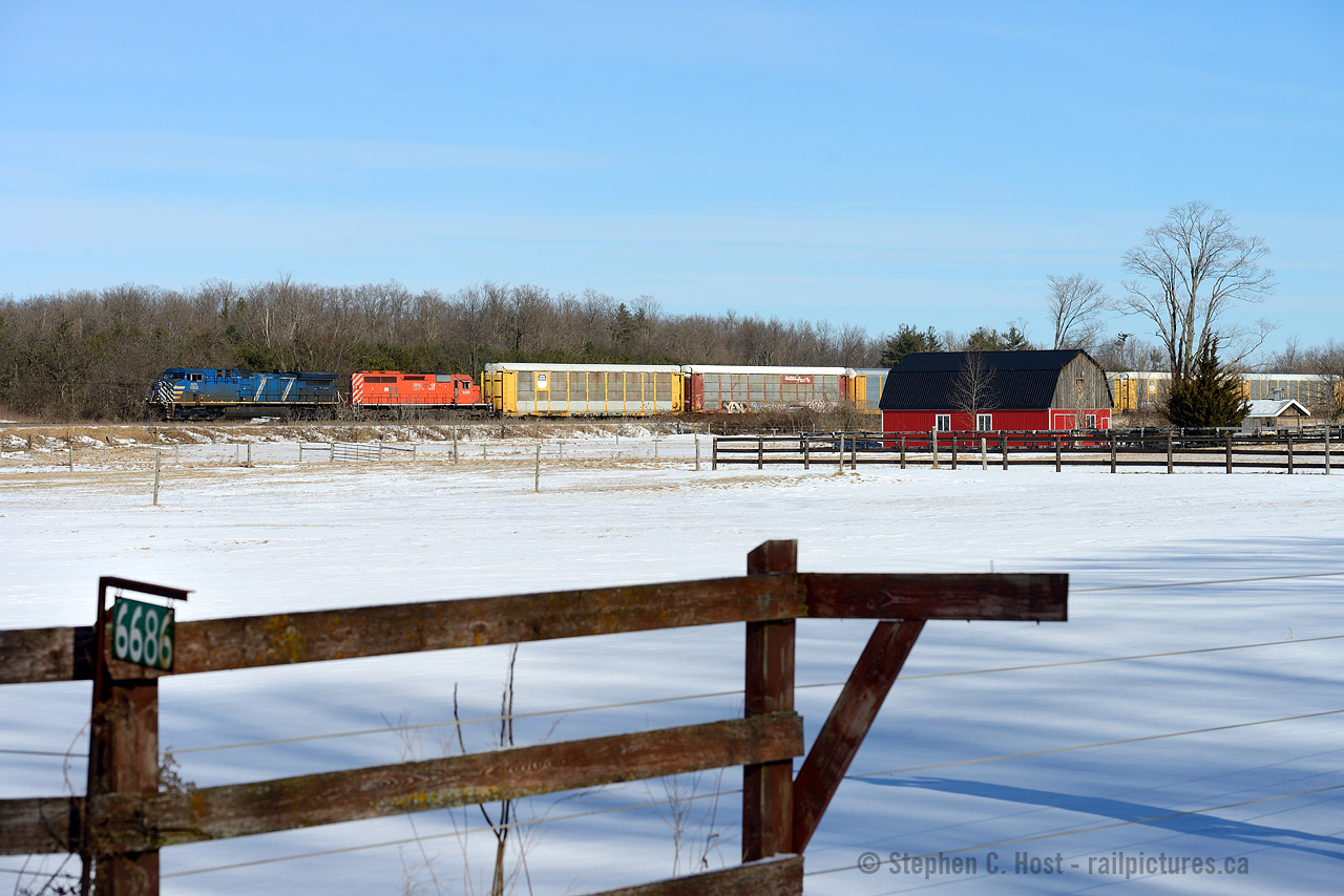 CP 147 with a pair of oddballs head west on the Galt Sub.