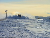 <b>Battlefield:</b> While suburban Stratford residents enjoy a morning Family Day coffee, the Goderich-Exeter Railway crew are busy battling mother nature. Accelerating out of town limits, a dark and ominous looking cloud of snow is cast aside into adjacent farmers fields. At centre: GEXR's black, hardened, 1938 built snow tank, 55413 - the war room for the winter battle. A few smooth drifts of snow have formed within the right of way, in contrast to the jagged chunks cast aside, clear evidence of prior battles with 55413. Sorry about your luck, mother nature, but you lost, and Spring is just around the corner.