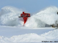 You'll have to take my word for it that this train is powered by two FP9A's. After dropping the flanger blades a couple more inches, Foreman Jack Hyde and Brad Jolliffe are in the plow, looking closely at a few photographers (including yours truly) about to get dumped on, surely with smiles on their faces. OSR flanged nearly all of their track today with CPR 401005 but I was only witness to part of the journey.