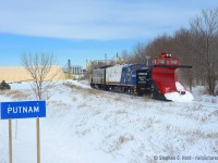 Two F's power the first plow extra of OSR's 2015 winter season, passing through the small town of Putnam. Up ahead, heavy drifting near Gladstone, where views of the entire train are much harder to come by.