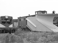 <br />
<br />
The carcass of #52 (GMD type NW-2) sits on Death Row near the Chatham Street roundhouse.  Internet research shows that she was built in January, 1948.  It wouldn’t be until 05/88 that she was sent to Atlas Steel in Welland to be scrapped. 
<br />
<br />
Meanwhile, the plow looks ready to do battle with the next blizzard. 
