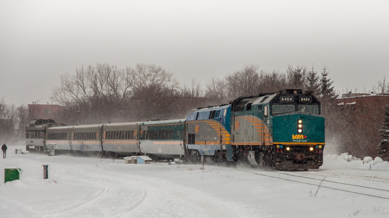 Here is VIA #55 seen in Montreal on it's way to Toronto via Ottawa with a Park Car on the tail end. This shot was taken on the CN Montreal Sub near the St-Ambroise Crossing in St-Henri, a neighbourhood in Montreal Quebec Canada.