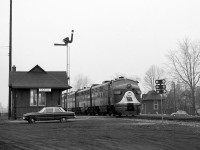 An eastbound Wabash Railroad train with a healthy lashup of F-units (WAB F7A 726 in the lead position) stops on a red board at the Canadian National station in Simcoe ON (Mile 73.2) on CN's Cayuga Sub.<br><br>Part of the former Great Western Railway "Canada Air Line", service through Simcoe ended when CN abandoned the line from Mile 54 to 82 in December 1995. The station pictured is a replacement station built in 1930/31, after the original was destroyed by fire in July 1930.<br><br>Canadian-built Wabash F7A 726 (originally numbered 1189A, blt. March 1952, serial A488, order C157) would later go on to work for Norfolk and Western as their N&W 3726, seen here at Thamesville ON 10 years later: <a href=http://www.railpictures.ca/?attachment_id=18006><b>http://www.railpictures.ca/?attachment_id=18006</b></a>