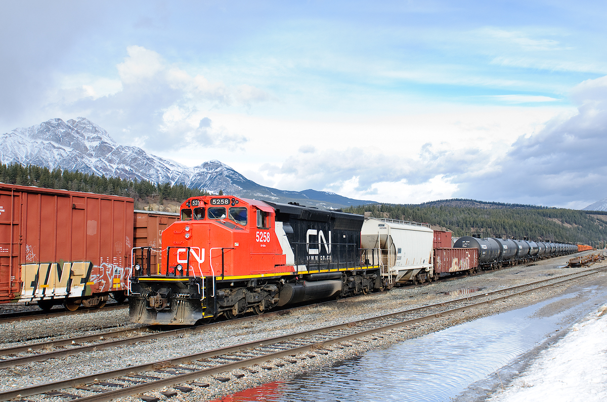 One of CN's former LNG test units awaits a new crew to take a hodge podge loaded CWR train westward.